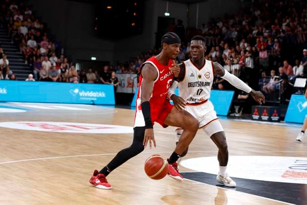 13.08.2023, Deutscher Basketball Bund, Supercup 2023, Hamburg, edel-optics.de Arena, Finale, Deutschland - Kanada, Shai Gilgeous-Alexander (CAN, No2), Dennis Schröder (GER, No17) Hamburg edel-optics.de Arena Hamburg Germany