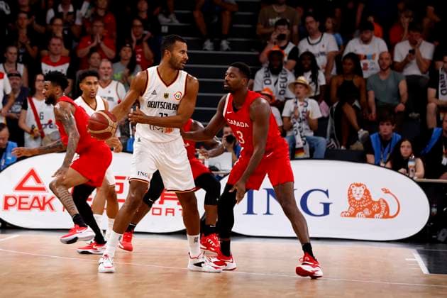 13.08.2023, Deutscher Basketball Bund, Supercup 2023, Hamburg, edel-optics.de Arena, Finale, Deutschland - Kanada, Johannes Thiemann (GER, No32), Melvin Ejim (CAN No3) Hamburg edel-optics.de Arena Hamburg Germany