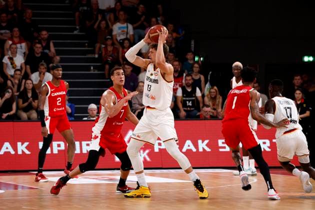 13.08.2023, Deutscher Basketball Bund, Supercup 2023, Hamburg, edel-optics.de Arena, Finale, Deutschland - Kanada, Moritz Wagner (GER, No13), Dwight Powell (CAN, No7) Hamburg edel-optics.de Arena Hamburg Germany