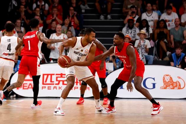13.08.2023, Deutscher Basketball Bund, Supercup 2023, Hamburg, edel-optics.de Arena, Finale, Deutschland - Kanada, Johannes Thiemann (GER, No32), Melvin Ejim (CAN No3) Hamburg edel-optics.de Arena Hamburg Germany