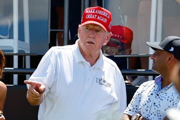 BEDMINSTER, NJ - AUGUST 13: Former President Donals J. Trump at the first tee during the final round of LIV Golf Bedminster on August 13, 2023 at Trump National Golf Club in Bedminster, New Jersey. (Photo by Rich Graessle Icon Sportswire) GOLF: AUG 13 LIV Golf Bedminster EDITORIAL USE ONLY Icon23081322566