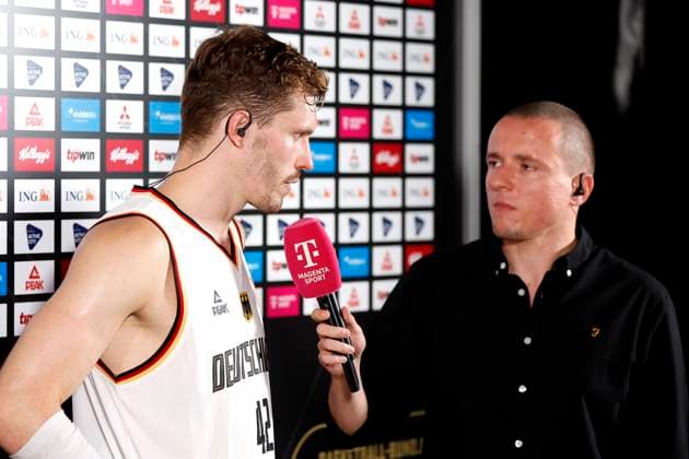 13.08.2023, Deutscher Basketball Bund, Supercup 2023, Hamburg, edel-optics.de Arena, Finale, Deutschland - Kanada, Anderas Obst (GER, No42) im Interview mit Benni Zander, Magenta Hamburg edel-optics.de Arena Hamburg Germany