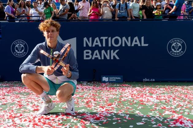 TORONTO, ON - AUGUST 13: Jannik Sinner of Italy poses with the championship trophy after final game of the National Bank Open, part of the Hologic ATP, Tennis Herren Tour, at Sobeys Stadium on August 13, 2023 in Toronto, Canada. (Photo by Julian Avram Icon Sportswire) TENNIS: AUG 13 National Bank Open EDITORIAL USE ONLY Icon2308130047
