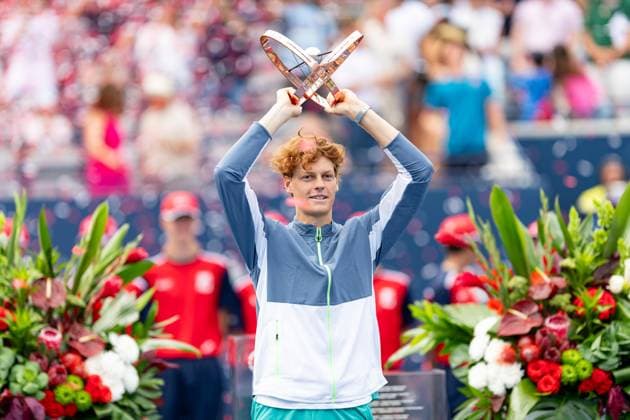 TORONTO, ON - AUGUST 13: Jannik Sinner of Italy poses with the championship trophy after winning the final game of the National Bank Open, part of the Hologic ATP, Tennis Herren Tour, at Sobeys Stadium on August 13, 2023 in Toronto, Canada. (Photo by Julian Avram Icon Sportswire) TENNIS: AUG 13 National Bank Open EDITORIAL USE ONLY Icon2308131467