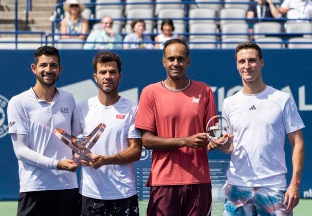 (230814) -- TORONTO, Aug. 14, 2023 -- Marcelo Arevalo of Salvador Jean-julien Rojer of the Netherlands, Rajeev Ram of the United States Joe Salisbury of Britain (L-R) pose for photos with their trophies during the awarding ceremony after the men s doubles final match between Rajeev Ram of the United States Joe Salisbury of Britain and Marcelo Arevalo of Salvador Jean-julien Rojer of the Netherlands at the 2023 National Bank Open in Toronto, Canada, on Aug. 13, 2023. (Photo by Xinhua) (SP)CANADA-TORONTO-TENNIS-NATIONAL BANK OPEN-MEN S DOUBLES FINAL ZouxZheng 