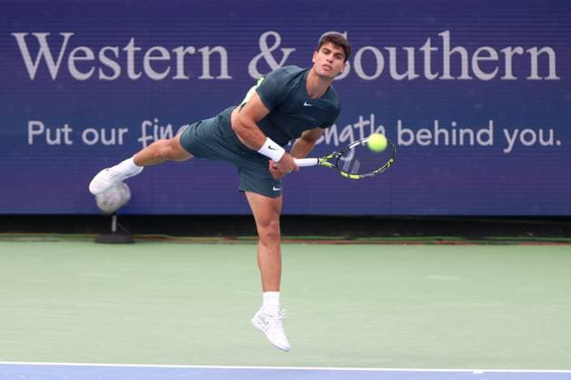 CINCINNATI, OH - AUGUST 17: Carlos Alcaraz of Spain watches his serve during the third round at the Western & Southern Open at Lindner Family Tennis Center on August 17, 2023 in Mason, Ohio. (Photo by Ian Johnson Icon Sportswire) TENNIS: AUG 17 Western & Southern Open EDITORIAL USE ONLY Icon230817038