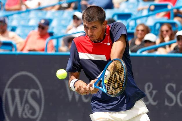 CINCINNATI, OH - AUGUST 18: Alexei Popyrin of Australia hits a backhand during the fourth round at the Western & Southern Open at Lindner Family Tennis Center on August 18, 2023 in Mason, Ohio. (Photo by Ian Johnson Icon Sportswire) TENNIS: AUG 18 Western & Southern Open EDITORIAL USE ONLY Icon230818002