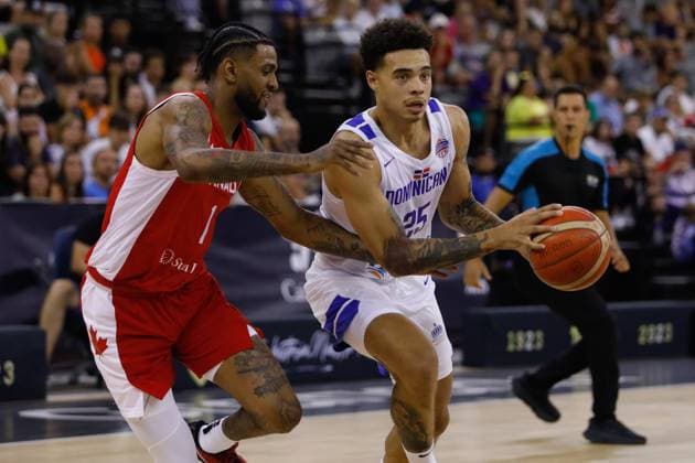 August 18, 2023, GRANADA, GRANADA, SPAIN: Lester Quinones of Dominican Republic and Nickeil Alexander-Walker of Canada in action during City of Granada Tournament for the Centenary of the FEB, basketball match played between Canada and Dominican Republic at Palacio de Deportes on August 17, 2023, in Granada, Spain. GRANADA SPAIN - ZUMAa181 20230818_zaa_a181_062 Copyright: xAlexxCamarax