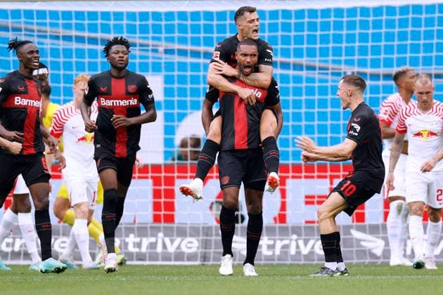 TAH Jonathan Team Bayer 04 Leverkusen Jubel mit XHAKA Granit und WIRTZ Florian nach seinem Tor zum 2 : 0 DFL Fussball Bundesliga Saison 2023 - 2024 Spiel Bayer 04 Leverkusen - RB Leipzig 3 : 2 am 19.08.2023 in Leverkusen DFL REGULATIONS PROHIBIT ANY USE OF PHOTOGRAPHS as IMAGE SEQUENCES and or QUASI-VIDEO Copyright: xLacixPerenyix