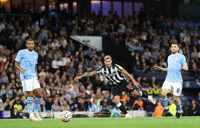 19th August 2023: Etihad Stadium , Manchester, England; Premier League Football, Manchester City v Newcastle United; Bruno Guimaraes of Newcastle United shoots wide  ActionPlus12545415 DavidxBlunsden