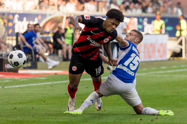 1. Fussball Bundesliga: Eintracht Frankfurt - SV Darmstadt 98, Deutsche Bank Park, Frankfurt, 20.08.2023 Jessic Ngankam (Eintracht Frankfurt 18) & Fabian Nürnberger (SV Darmstadt 98 15), Eintracht Frankfurt - SV Darmstadt 98, Frankfurt, Deutsche Bank Park, 20.8.2023 Copyright: xBEAUTIFULxSPORTS Gawlikx