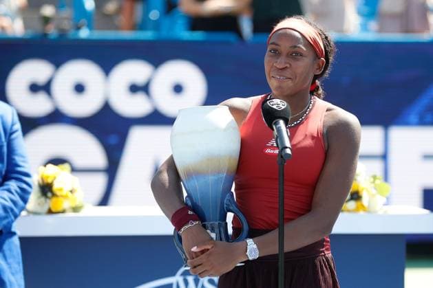 CINCINNATI, OH - AUGUST 20: Coco Gauff of the United States talks to the fans while holding the Rookwood Cup after defeating Karolina Muchova of the Czech Republic 6-3, 6-4. In the final round at the Western & Southern Open at Lindner Family Tennis Center on August 20, 2023 in Mason, Ohio. (Photo by Ian Johnson Icon Sportswire) TENNIS: AUG 20 Western & Southern Open EDITORIAL USE ONLY Icon230820021