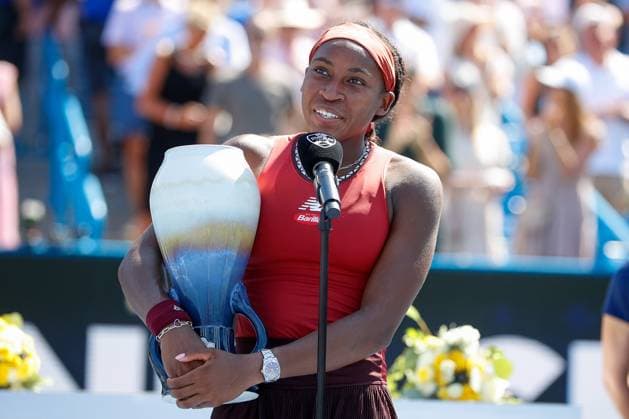 CINCINNATI, OH - AUGUST 20: Coco Gauff of the United States talks to the fans while holding the Rookwood Cup after defeating Karolina Muchova of the Czech Republic 6-3, 6-4. In the final round at the Western & Southern Open at Lindner Family Tennis Center on August 20, 2023 in Mason, Ohio. (Photo by Ian Johnson Icon Sportswire) TENNIS: AUG 20 Western & Southern Open EDITORIAL USE ONLY Icon230820023