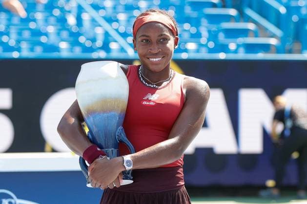 CINCINNATI, OH - AUGUST 20: Coco Gauff of the United States poses with the Rookwood Cup after defeating Karolina Muchova of the Czech Republic 6-3, 6-4. In the final round at the Western & Southern Open at Lindner Family Tennis Center on August 20, 2023 in Mason, Ohio. (Photo by Ian Johnson Icon Sportswire) TENNIS: AUG 20 Western & Southern Open EDITORIAL USE ONLY Icon230820027
