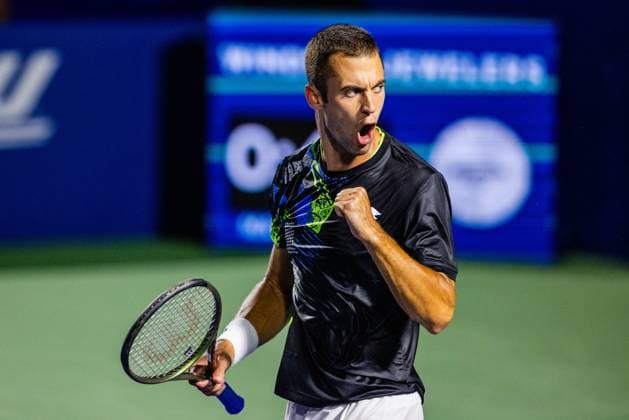 August 23, 2023: Laslo Djere celebrates after taking the first set during the third round of the 2023 Winston-Salem Open at Wake Forest Tennis Complex in Wnston-Salem, NC. ( ) Wnston-Salem United States - ZUMAc04_ 20230823_zma_c04_130 Copyright: xScottxKinserx