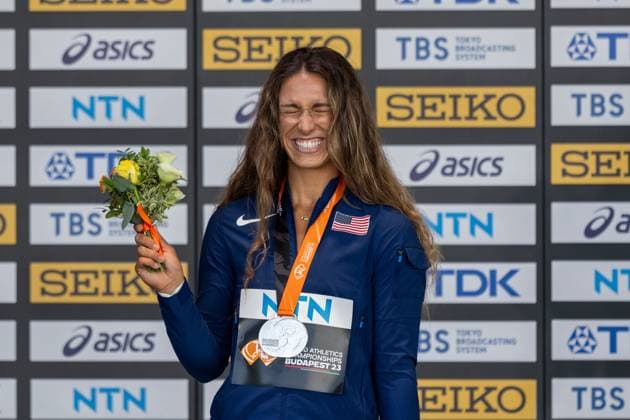 (230824) -- BUDAPEST, Aug. 24, 2023 -- Silver medalist Valarie Allman of the United States celebrates during the awarding ceremony for the women s discus throw at the World Athletics Championships 2023 in Budapest, Hungary, Aug. 23, 2023. ) (SP)HUNGARY-BUDAPEST-ATHLETICS-WORLD CHAMPIONSHIPS-DAY 5 MengxDingbo 