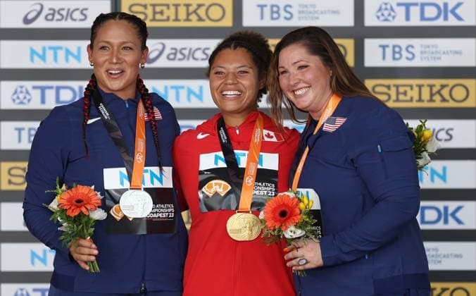 (230826) -- BUDAPEST, Aug. 26, 2023 -- Gold medalist Camryn Rogers (C) of Canada poses with silver medalist Janee Kassanavoid (L) of the United States and bronze medalist DeAnna Price of the United States during the awarding ceremony for the women s hammer throw final during the World Athletics Championships in Budapest, Hungary, Aug. 25, 2023. ) (SP)HUNGARY-BUDAPEST-ATHLETICS-WORLD CHAMPIONSHIPS-DAY 7 LixYing 