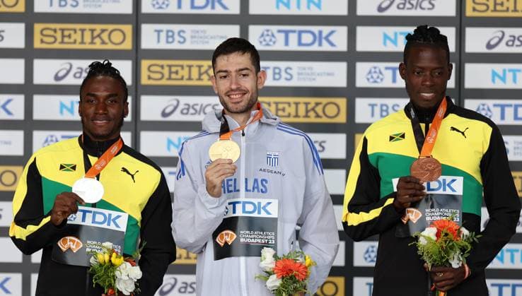 (230826) -- BUDAPEST, Aug. 26, 2023 -- Gold medalist Miltiadis Tentoglou (C) of Greece poses with silver medalist Wayne Pinnock (L) of Jamaica and bronze medalist Tajay Gayle of Jamaica during the awarding ceremony for the men s long jump final during the World Athletics Championships in Budapest, Hungary, Aug. 25, 2023. ) (SP)HUNGARY-BUDAPEST-ATHLETICS-WORLD CHAMPIONSHIPS-DAY 7 LixYing 