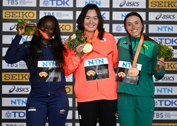 (230827) -- BUDAPEST, Aug. 27, 2023 -- Gold medalist Kitaguchi Haruka (C) of Japan, Silver medalist Flor Denis Ruiz Hurtado (L) of Colombia and bronze medalist Mackenzie Little of Australia pose for photos during the award ceremony for the Women s Javelin Throw at the World Athletics Championships Budapest 2023 in Budapest, Hungary, on Aug. 26, 2023. ) (SP)HUNGARY-BUDAPEST-ATHLETICS-WORLD CHAMPIONSHIPS-DAY 8 SongxYanhua 