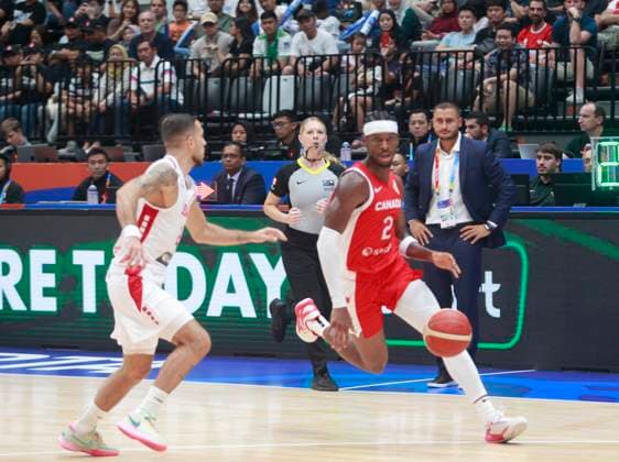 JAKARTA, INDONESIA AUGUST 27: Shai Gilgeous-Alexander (L) of Canada challenge by Wael Arakji (L) of Lebanon on Canada vs Lebanon game during 2023 FIBA Basketball World Cup in Jakarta, Indonesia on August 27, 2023. The 2023 FIBA Basketball World Cup will held on August 25 until September 10, 2023 in Jakarta - Indonesia, Manila - Philipines dan Okinawa Japan. BASKET BALL: Canada vs Liban - Jakarta - Coupe du Monde FIBA - 26 08 2023 YuliSeperi Panoramic 