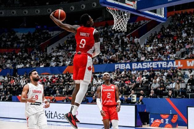 (230827) -- JAKARTA, Aug. 27, 2023 -- RJ Barret (Top) of Canada dunks during the Group H match between Lebanon and Canada at the 2023 FIBA World Cup in Jakarta, Indonesia, Aug. 27, 2023. ) (SP)INDONESIA-JAKARTA-BASKETBALL-FIBA WORLD CUP-GROUP H-LBN VS CAN AgungxKuncahyaxB. 
