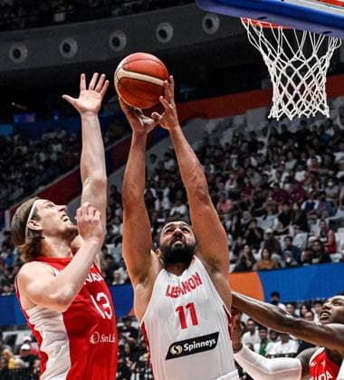 (230827) -- JAKARTA, Aug. 27, 2023 -- Ali Haidar (C) of Lebanon vies for the ball during the Group H match between Lebanon and Canada at the 2023 FIBA World Cup in Jakarta, Indonesia, Aug. 27, 2023. ) (SP)INDONESIA-JAKARTA-BASKETBALL-FIBA WORLD CUP-GROUP H-LBN VS CAN AgungxKuncahyaxB. 