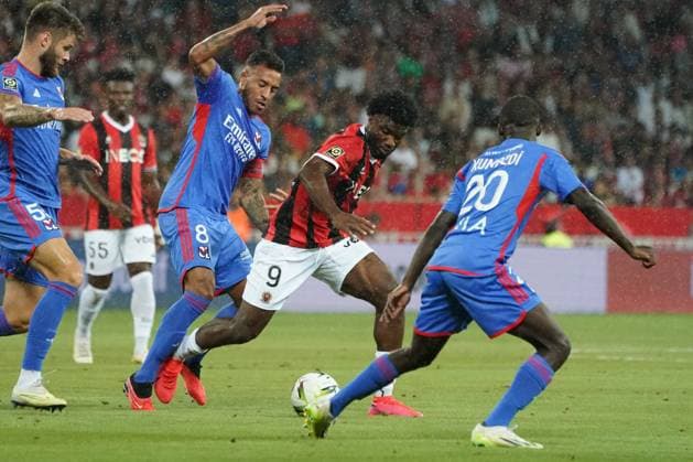 Terem Moffi (OGC Nice) - Corentin Tolisso (Lyon) - SaÃ«l Kumbedi (Lyon) FOOTBALL : OGC Nice vs Lyon - Ligue 1 Uber Eats - Nice - 027 08 2023 NorbertScanella Panoramic 