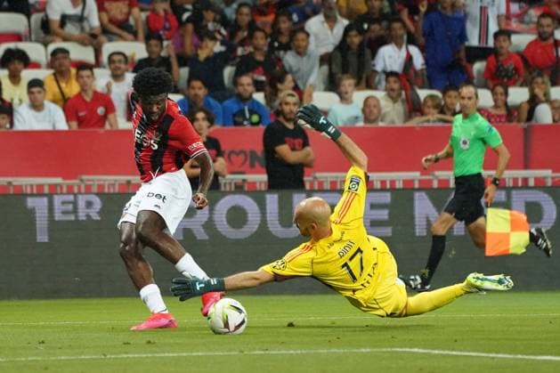 Terem Moffi (OGC Nice) - Remy Riou (Lyon) FOOTBALL : OGC Nice vs Lyon - Ligue 1 Uber Eats - Nice - 027 08 2023 NorbertScanella Panoramic 