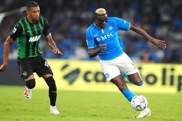 Italian soccer Serie A match - SSC Napoli vs US Sassuolo Victor Osimhen i competes for the ball with RUAN TRESSOLDI of U.S. Sassuolo of SSC Napoli during Serie A between SSC Napoli vs US Sassuolo at Diego Armando Maradona Stadium Naples Italy Copyright: xFOTOAGENZIAx