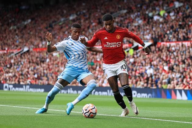 Football - Premier League - Manchester United, ManU v Nottingham Forest 26th August 2023 - Premier League - Manchester United v Nottingham Forest - Danilo of Nottingham Forest tackles Marcus Rashford of Manchester United - Photo: Simon Stacpoole Offside. Manchester UK Copyright: xSimonxStacpoolexOffside
