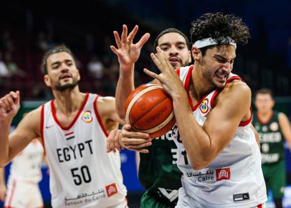 (230829) -- MANILA, Aug. 29, 2023 -- Egypt s Patrick Gardner (R) competes during the Group D match between Egypt and Mexico at the 2023 FIBA World Cup in Manila, the Philippines, Aug. 29, 2023. ) (SP)PHILIPPINES-MANILA-BASKETBALL-FIBA WORLD CUP-GROUP D-EGY VS MEX RouellexUmali 