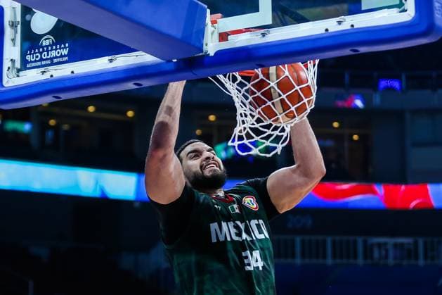 (230829) -- MANILA, Aug. 29, 2023 -- Mexico s Joshua Ibarra dunks during the Group D match between Egypt and Mexico at the 2023 FIBA World Cup in Manila, the Philippines, Aug. 29, 2023. ) (SP)PHILIPPINES-MANILA-BASKETBALL-FIBA WORLD CUP-GROUP D-EGY VS MEX RouellexUmali 