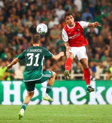 Panathinaikos F.C. v S.C. Braga UEFA Champions League Filip Djuricic of Panathinaikos F.C. and Rodrigo Zalazar of F.C Braga during the UEFA Champions League Play-Off Second Leg match at the Olympic Stadium (Greece), Marousi Copyright: xYannisxHalasx FIL-18896-0081 UK Newspapers OUT