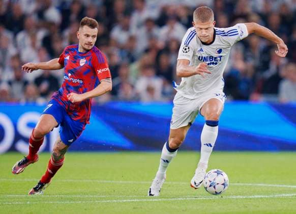 FCK s Andreas Cornelius and Rakow Czestochowa s Fran Tudor after the Champions League match between FC Copenhagen and Rakow Czestochowa at Parken in Copenhagen on Wednesday, August 30, 2023.. (Photo: Liselotte Sabroe Ritzau Scanpix) , Copenhagen Denmark