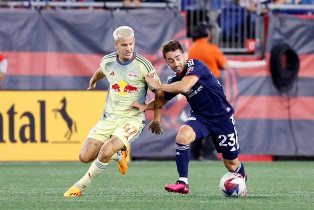 FOXBOROUGH, MA - AUGUST 30: New England Revolution midfielder Nacho Gil (23) holds off New York Red Bulls defender John Tolkin (47) during a match between the New England Revolution and the New York Red Bulls on August 30, 2023, at Gillette Stadium in Foxborough, Massachusetts. (Photo by Fred Kfoury III Icon Sportswire) SOCCER: AUG 30 MLS, Fussball Herren, USA - New England Revolution vs New York Red Bulls EDITORIAL USE ONLY Icon482230830013