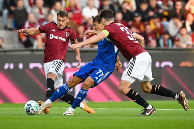 Sparta Praha v Dinamo Zagreb - UEFA Europa League Play Off Round: Second Leg Dario Spikic of Dinamo Zagreb shoots whilst under pressure of Matej Rynes and Ladislav Krejci of Sparta Praha during the UEFA Europa League Play Off Round Second Leg match between Sparta Praha and Dinamo Zagreb at Letna Stadium on August 31, 2023 in Prague, Czech Republic. MarkoxLukunic PIXSELL