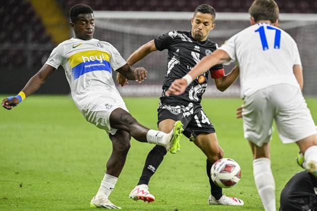 Union s Noah Sadiki and Lugano s Jonathan Sabbatini fight for the ball during a soccer match between Swiss FC Lugano and Belgian Royale Union Saint-Gilloise, Thursday 31 August 2023 in Geneva, Switzerland, the return leg of the play-off for the UEFA Europa League competition. LAURIExDIEFFEMBACQ  x73078557x