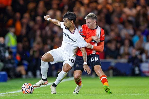 Luton Town v West Ham United Premier League 01 09 2023. Alfie Doughty (45) of Luton Town tussles with Lucas Paqueta (10) of West Ham United during the Premier League match between Luton Town and West Ham United at Kenilworth Road, Luton, England on 1 September 2023. Editorial use only DataCo restrictions apply See www.football-dataco.com , Copyright: xNigelxKeenex PSI-17963-0039
