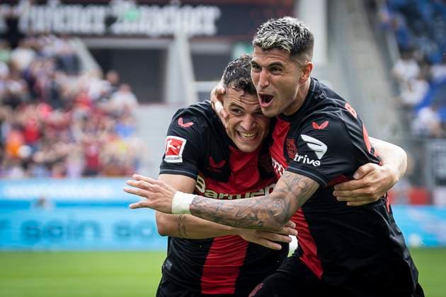 Sport Bilder des Tages Bayer 04 Leverkusen - SV Darmstadt 98, 02.09.2023 LEVERKUSEN, DEUTSCHLAND - 02. September: Der Torschuetze um 2:1, Exequiel Palacios (Bayer 04 Leverkusen, Nr. 25) feiert mit Granit Xhaka (Bayer 04 Leverkusen, Nr. 34) waehrend der Begegnung Bayer 04 Leverkusen - SV Darmstadt 98 in der 1. Fussball-Bundesliga am 02.09.2023 in der BayArena in Leverkusen. DFL REGULATIONS PROHIBIT ANY USE OF PHOTOGRAPHS AS IMAGE SEQUENCES AND OR QUASI-VIDEO. *** Bayer 04 Leverkusen SV Darmstadt 98, 02 09 2023 LEVERKUSEN, GERMANY 02 September The goal scorer at 2 1, Exequiel Palacios Bayer 04 Leverkusen, No 25 celebrates with Granit Xhaka Bayer 04 Leverkusen, Nr 34 during the match Bayer 04 Leverkusen SV Darmstadt 98 in the 1 soccer Bundesliga on 02 09 2023 at the BayArena in Leverkusen DFL REGULATIONS PROHIBIT ANY USE OF PHOTOGRAPHS AS IMAGE SEQUENCES AND OR QUASI VIDEO Copyright: xBEAUTIFULxSPORTS AxelxKohringx