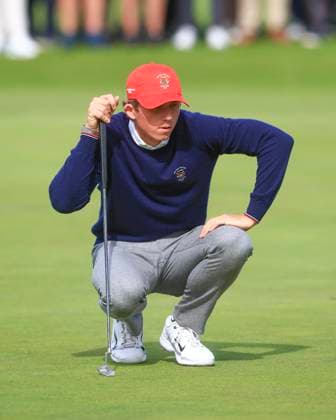 3rd September 2023; Old Course at St Andrews, St Andrews, Fife, Scotland; Walker Cup, Final Round; Gordon Sargent of the United States of America line sup a putt for the match on the 18th green on the Old Course, St Andrews, during a foursomes match  ActionPlus12550404 DavidxYoung
