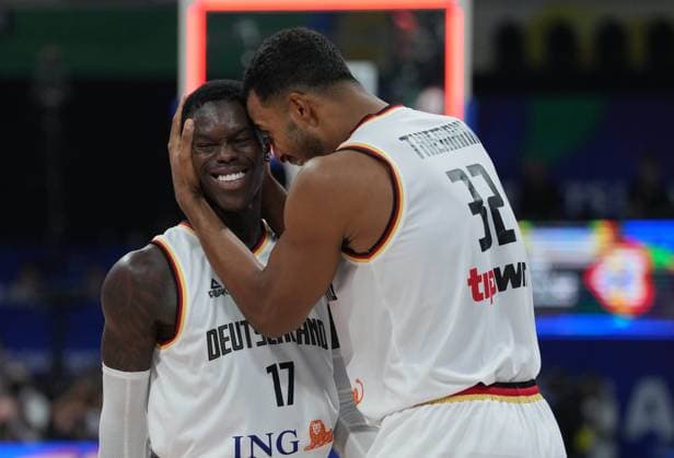 (230906) -- MANILA, Sept. 6, 2023 -- Germany s Dennis Schroder (L) celebrates with Johannes Thiemann after winning the quarterfinal between Germany and Latvia at the 2023 FIBA World Cup in Manila, the Philippines, Sept. 6, 2023. ) (SP)PHILIPPINES-MANILA-BASKETBALL-FIBA WORLD CUP-QUARTERFINAL-GER VS LAT MengxYongmin 