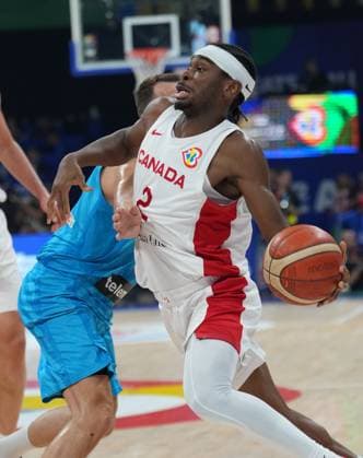 (230906) -- MANILA, Sept. 6, 2023 -- Canada s Shai Gilgeous-Alexander (R) breaks through during the quarterfinal between Canada and Slovenia at the 2023 FIBA World Cup in Manila, the Philippines, Sept. 6, 2023. ) (SP)PHILIPPINES-MANILA-BASKETBALL-FIBA WORLD CUP-QUARTERFINAL-CAN VS SLO MengxYongmin 