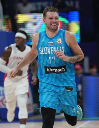 (230906) -- MANILA, Sept. 6, 2023 -- Slovenia s Luka Doncic reacts during the quarterfinal between Canada and Slovenia at the 2023 FIBA World Cup in Manila, the Philippines, Sept. 6, 2023. ) (SP)PHILIPPINES-MANILA-BASKETBALL-FIBA WORLD CUP-QUARTERFINAL-CAN VS SLO MengxYongmin 