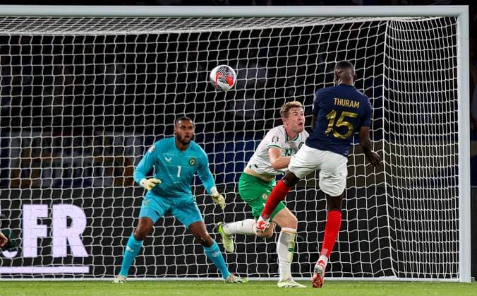 UEFA EURO, EM, Europameisterschaft,Fussball 2024 Qualifying Round Group B, Parc des Princes, Paris, France 7 9 2023 France vs Republic of Ireland Ireland s Gavin Bazunu and Nathan Collins and France s Marcus Thuram Marcus Thuram heads past Nathan Collins towards Gavin Bazunu 7 9 2023  Copyright: x INPHO RyanxByrnex RB1_1518