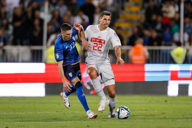 PRISTINA, KOSOVO - SEPTEMBER 9: Fabian Schar of Switzerland (R) against Altin Zeqiri of Kosovo (L) during the UEFA EURO, EM, Europameisterschaft,Fussball 2024 European qualifier match between Kosovo and Switzerland at Fadil Vokrri Stadium on September 9, 2023 in Pristina, Kosovo. Pristina Fadil Vokrri Stadium Kosovo Copyright: xJustPictures.ch NikolaxKrsticx jp-en-EuSpIm-20230909 _S2A3250