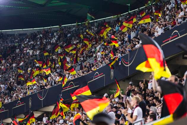 Wolfsburg, Volkswagen-Arena, 09.09.23: Fans of germany wave german flags prior the friendly match between Germany vs. Japan.