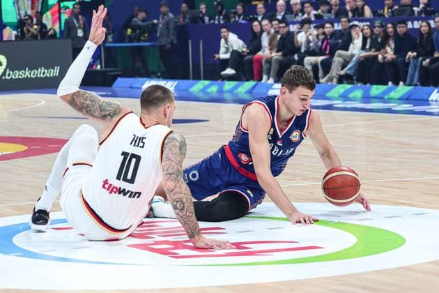 (230910) -- MANILA, Sept. 10, 2023 -- Nikola Jovic (R) of Serbia vies for the ball during the final between Germany and Serbia at the 2023 FIBA World Cup in Manila, the Philippines, Sept. 10, 2023. ) (SP)PHILIPPINES-MANILA-BASKETBALL-FIBA WORLD CUP-FINAL-GER VS SRB WuxZhuang 