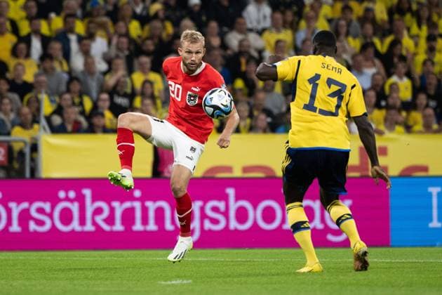 230912 Konrad Laimer of Austria and Ken Sema of Sweden during the UEFA EURO, EM, Europameisterschaft,Fussball Qualifier, EM, Europameisterschaft football match between Sweden and Austria on September 12, 2023 in Stockholm. Photo: Jesper Zerman BILDBYRAN kod JZ JM0531 bbeng fotboll football soccer fotball em-kval kval uefa euro qualifier sverige sweden sverige a österrike austria Copyright: JESPERxZERMAN BB230912JZ023