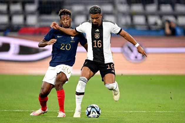 DORTMUND - (l-r) Kingsley Coman of France, Benjamin Henrichs of Germany during the friendly Interland match between Germany and France at the Signal Iduna Park on September 12, 2023 in Dortmund, Germany. ANP Hollandse Hoogte International Friendly, Länderspiel, Nationalmannschaft 2023 2024 xVIxANPxSportx xGerritxvanxKeulenxIVx 478043267 originalFilename: 478043267.jpg