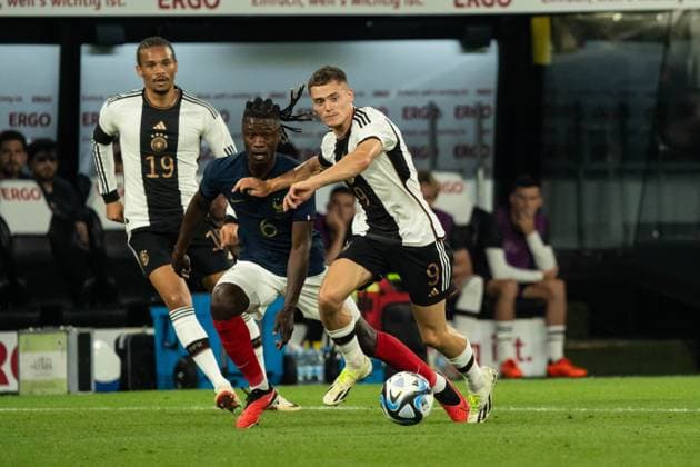 GER, FSP, Deutschland (GER) vs Frankreich (FRA) 12.09.2023, Signal Iduna Park, Dortmund, GER, FSP, Deutschland (GER) vs Frankreich (FRA) Im Bild: Zweikampf zwischen Florian Wirtz (Deutschland, 9) und Eduardo Camavinga (Frankreich, 6)
